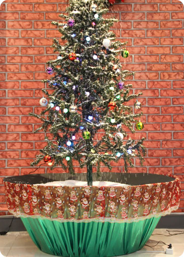 Snowing Christmas Tree - Green flower pot base with Beautiful Red patterned skirt - 2013